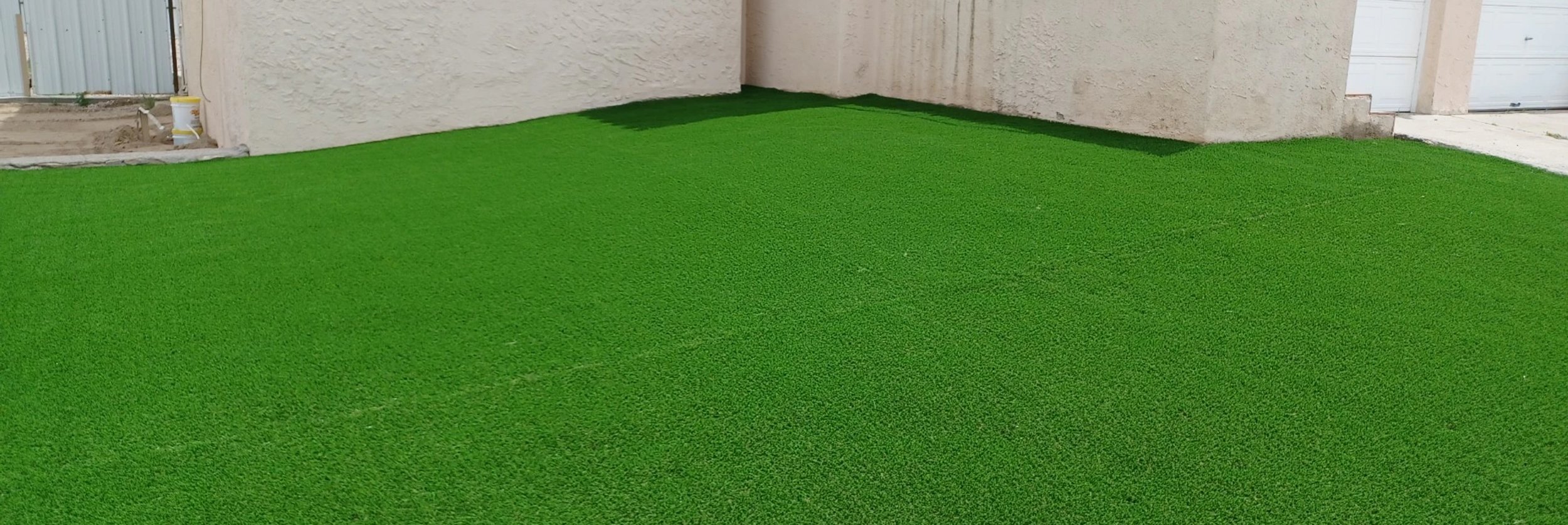 Large artificial turf front lawn install at a Las Cruces home