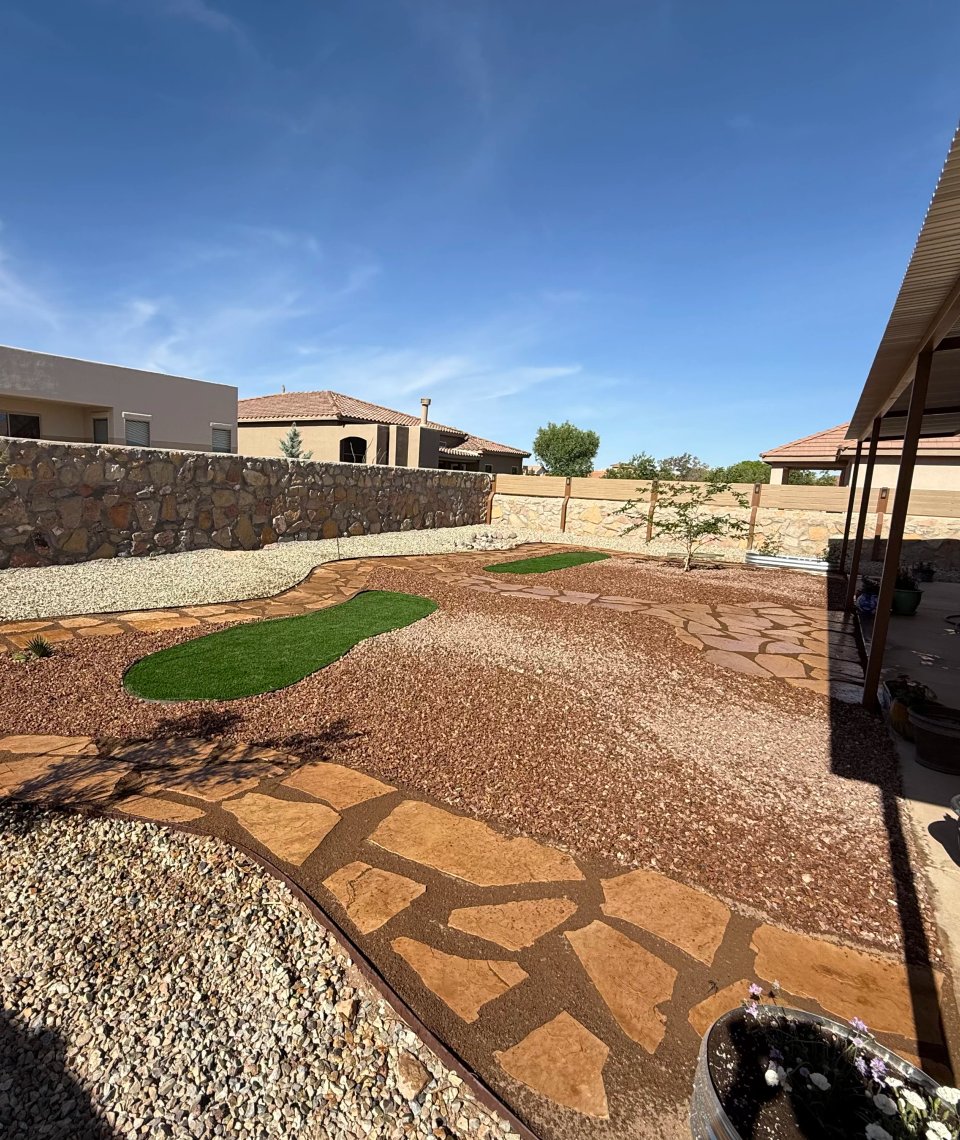 Flagstone patio installation by Brainard's Greenscapes in Las Cruces