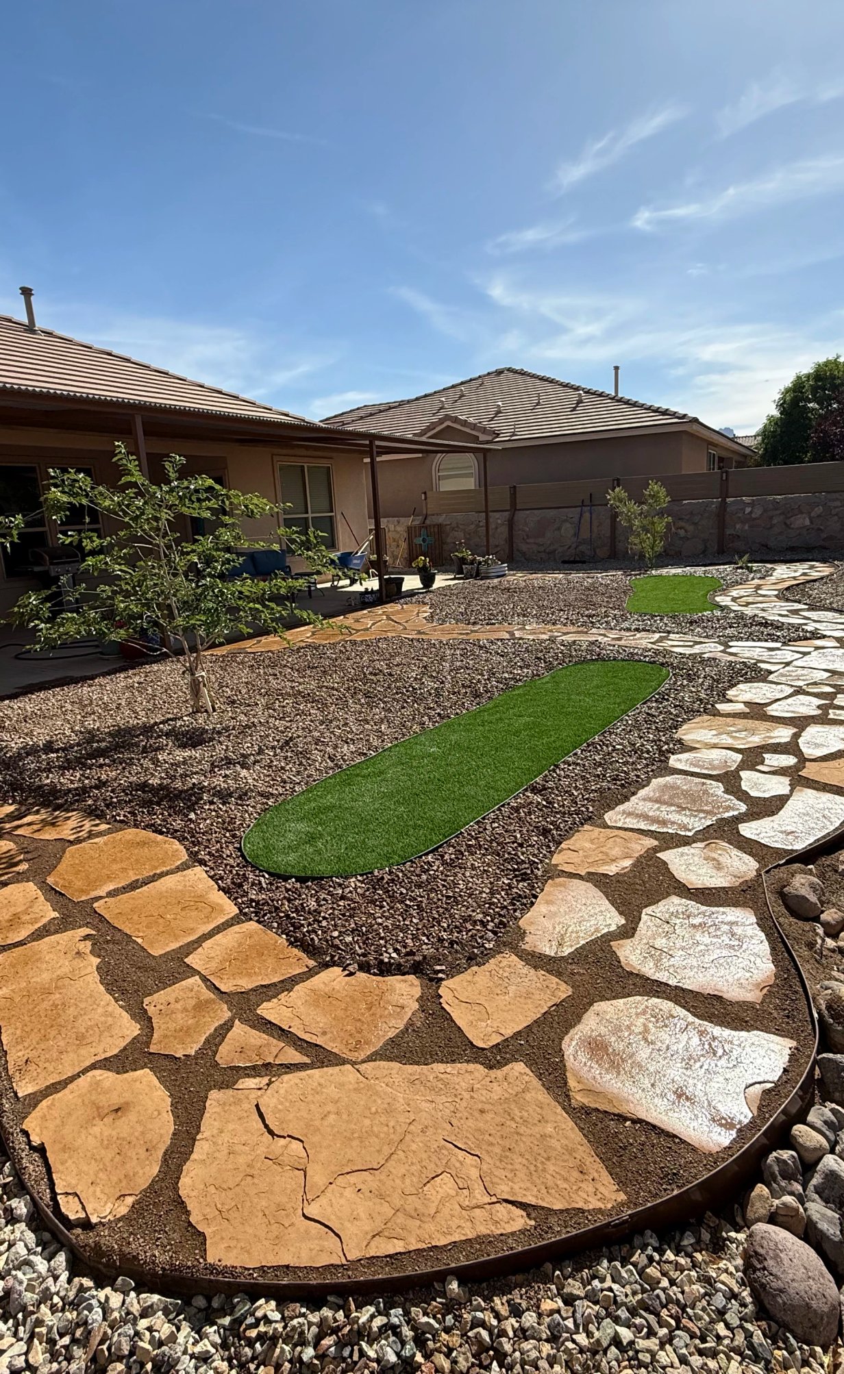 Brainard's Greenscapes flagstone patio installation in Las Cruces