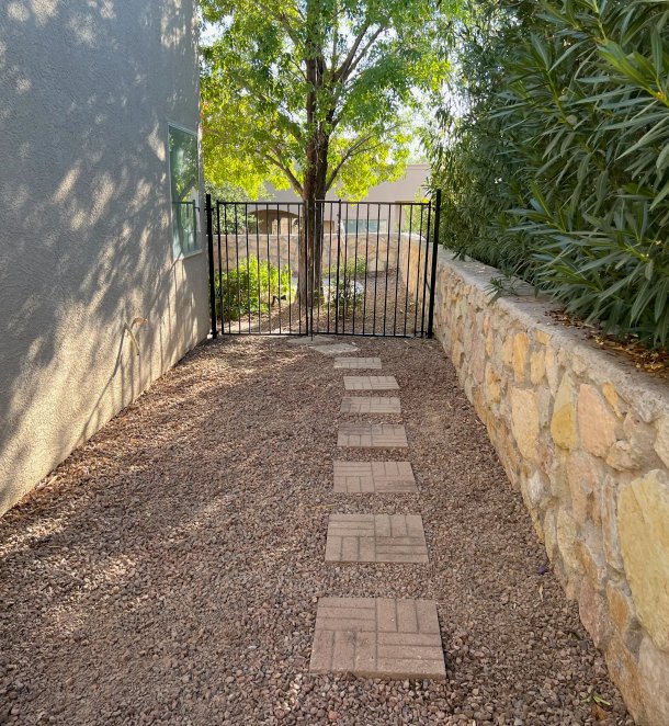 Custom paver patio installation with detailed stone work