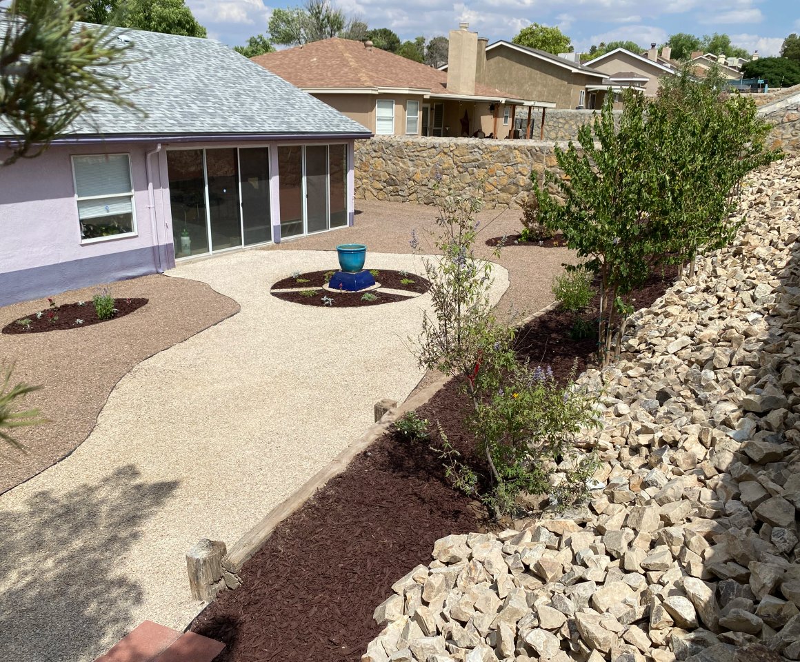 Decorative stone bed border project near Mesilla Plaza