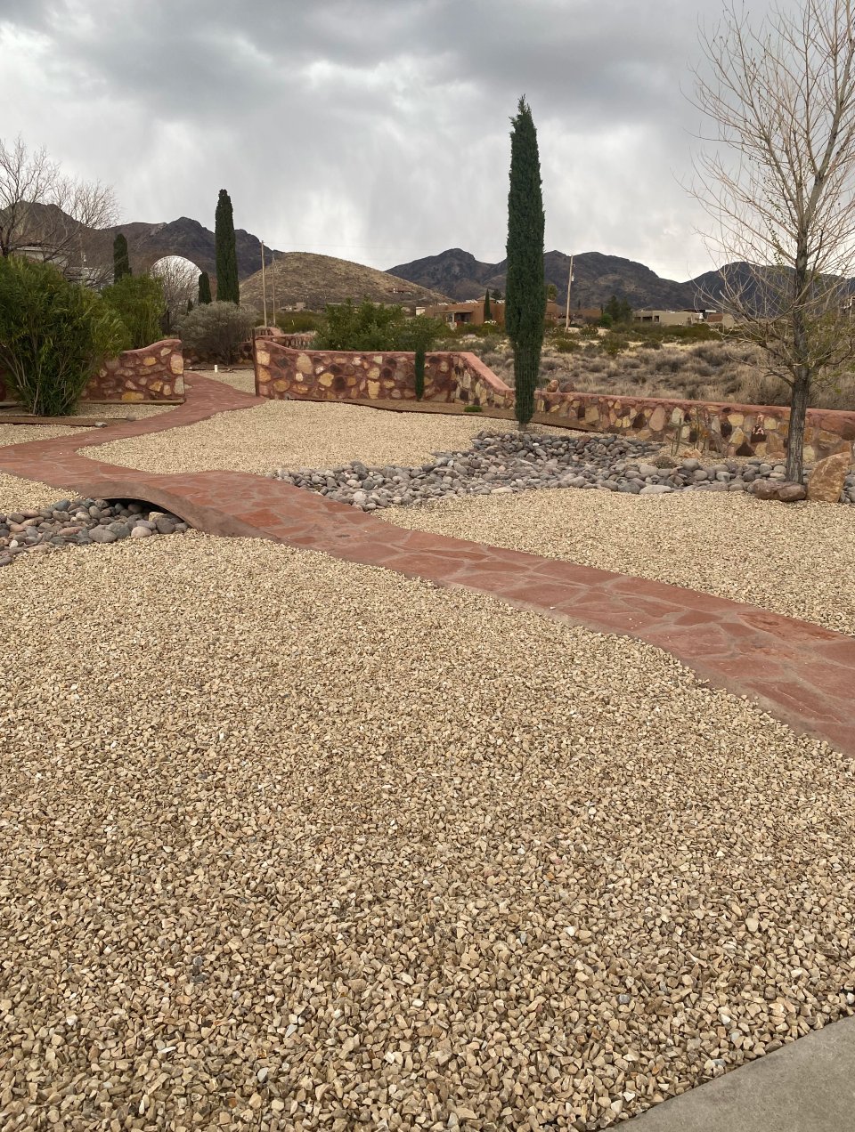 Custom flagstone walkway hardscaping project by Brainard's Greenscapes in Las Cruces