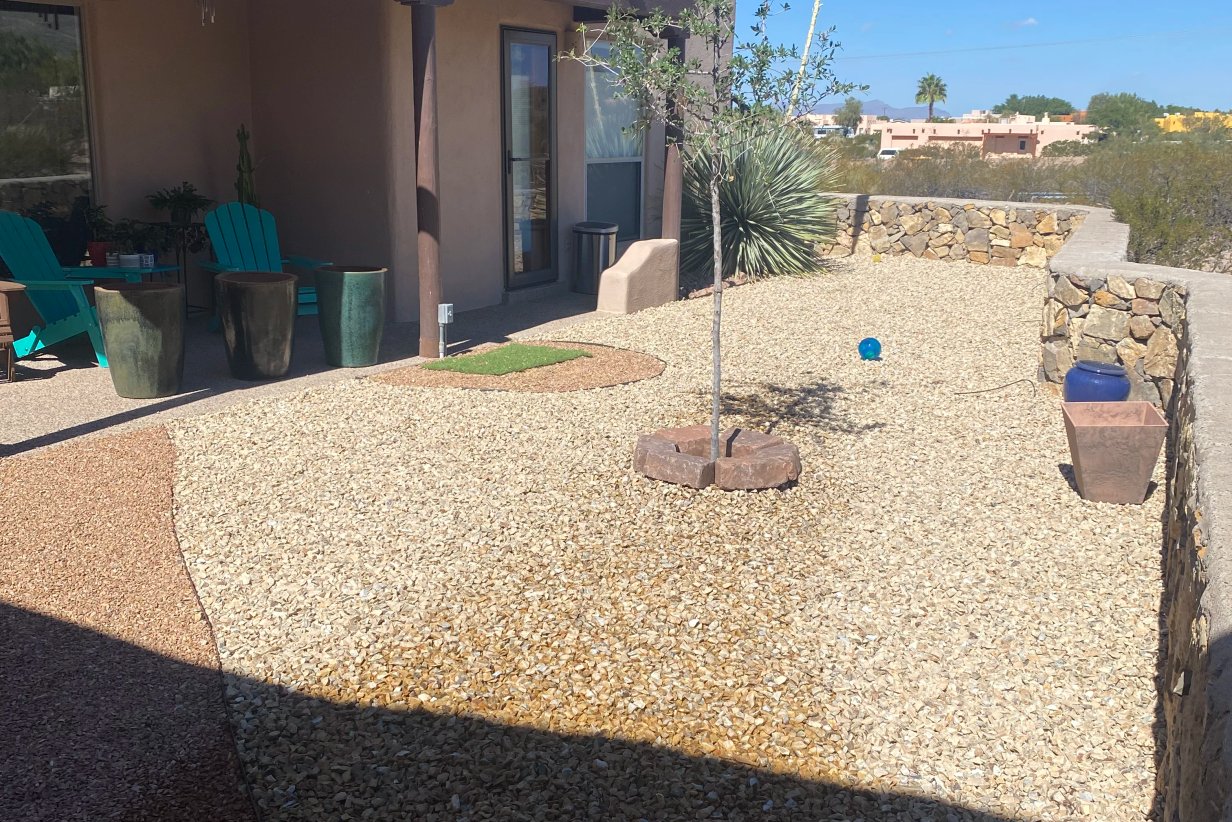Terraced retaining wall and xeriscape on a Picacho Hills hillside